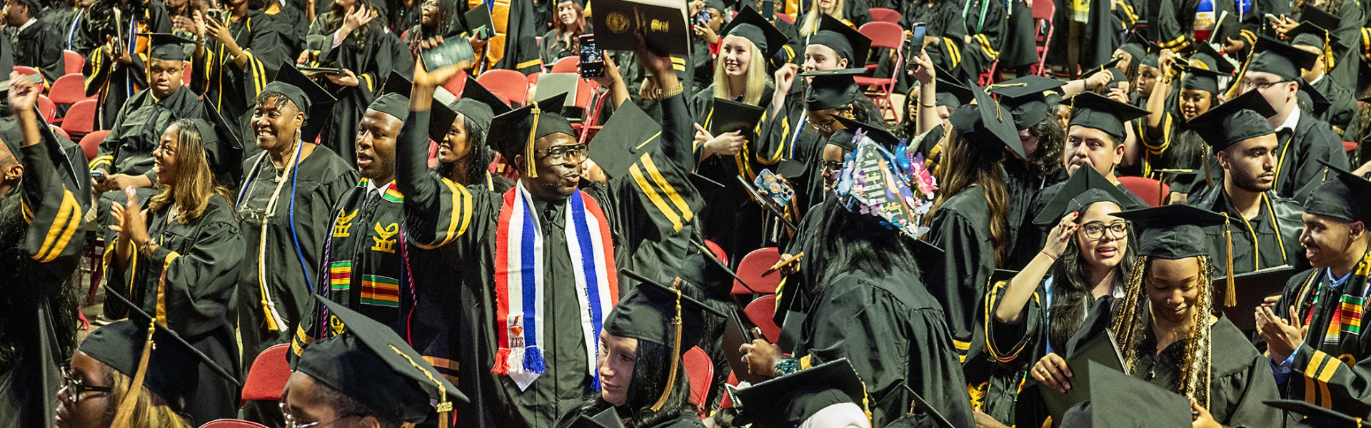 Students celebrate at a Community College of Philadelphia commencement ceremony