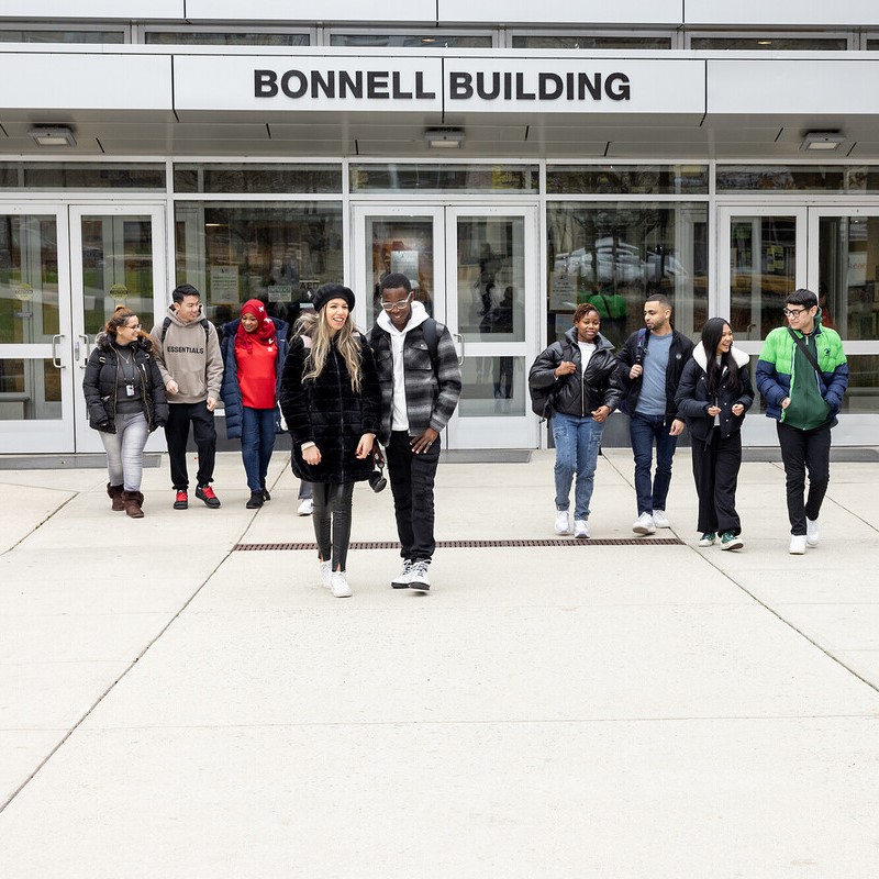 Students walk out of the Bonnell Building on the Community College of Philadelphia campus